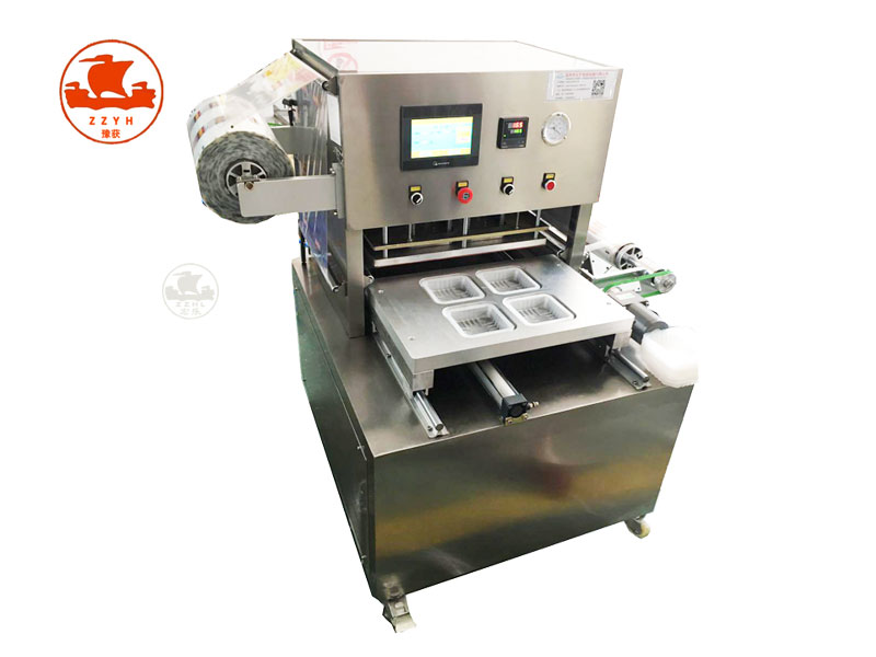 tray box sealing machine